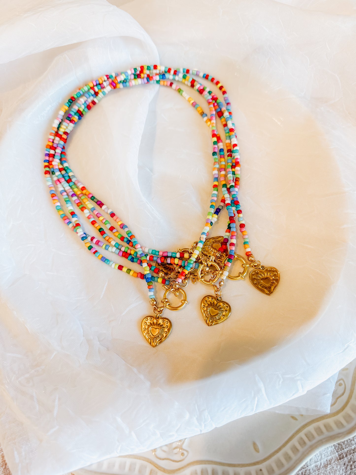Rainbow beaded heart charm necklace