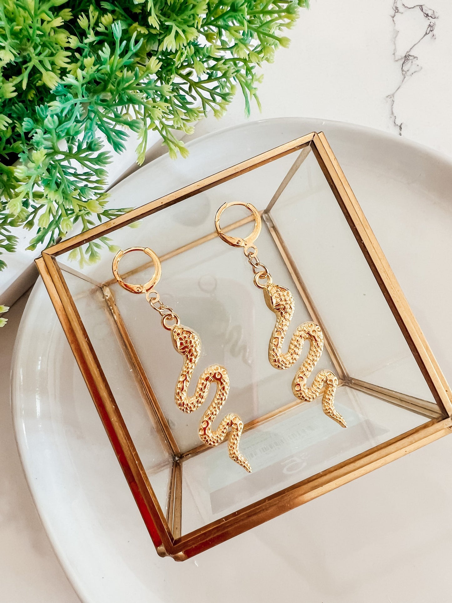 Gold snake earrings