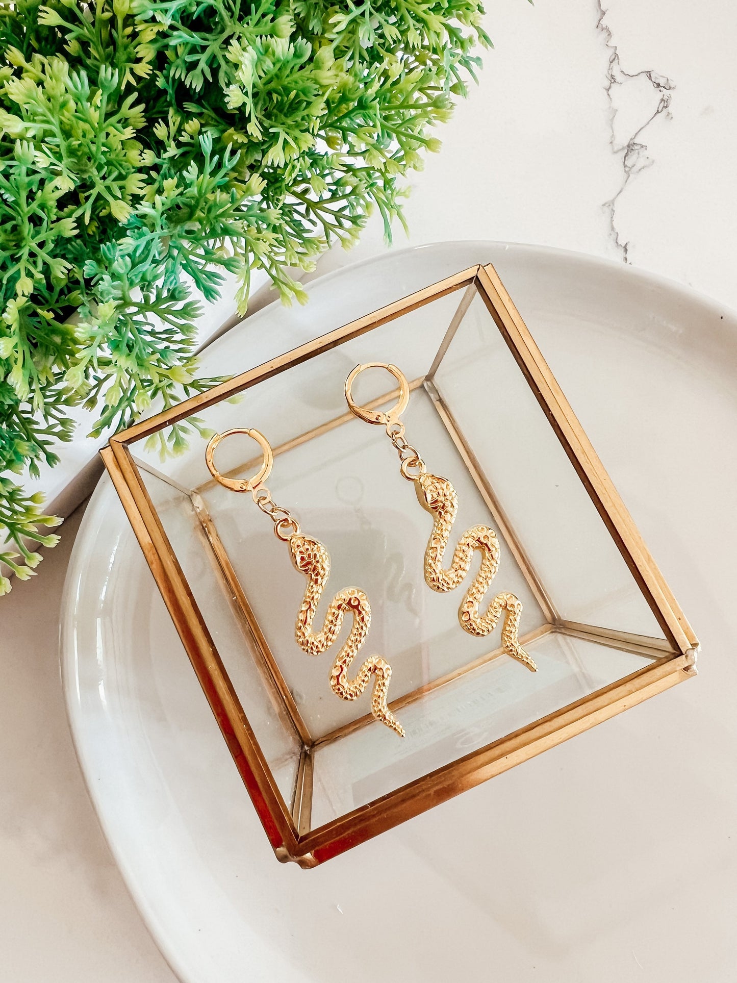 Gold snake earrings